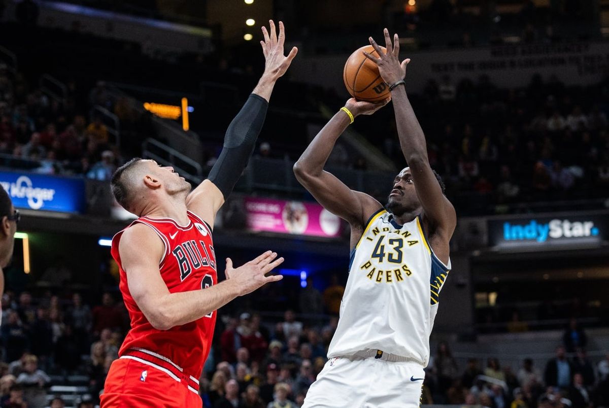 Jan 28, 2026; Indianapolis, Indiana, USA;  Indiana Pacers forward Pascal Siakam (43) shoots the ball while Chicago Bulls center Nikola Vucevic (9) defends in the second half at Gainbridge Fieldhouse. Mandatory Credit: Trevor Ruszkowski-Imagn Images