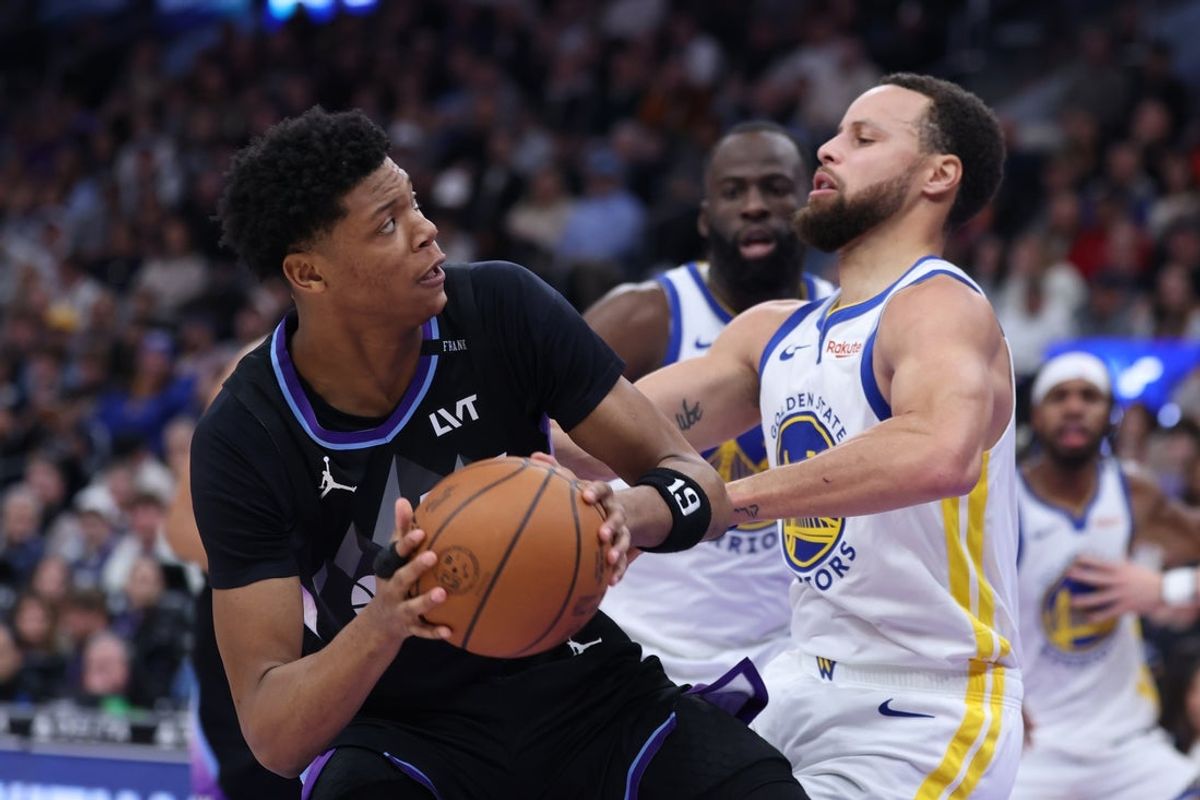 Jan 28, 2026; Salt Lake City, Utah, USA; Utah Jazz guard Ace Bailey (19) drives to the basket against Golden State Warriors guard Stephen Curry (30) during the first half at Delta Center. Mandatory Credit: Rob Gray-Imagn Images
