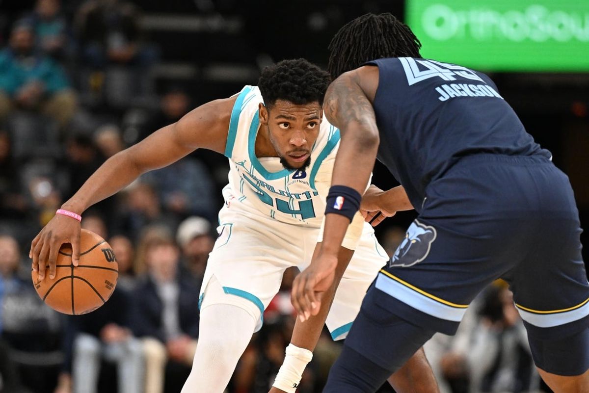 Jan 28, 2026; Memphis, Tennessee, USA; Charlotte Hornets forward Brandon Miller (24) faces up to defender Memphis Grizzlies forward GG Jackson (45) in the third quarter at FedExForum. Mandatory Credit: Matthew Smith-Imagn Images