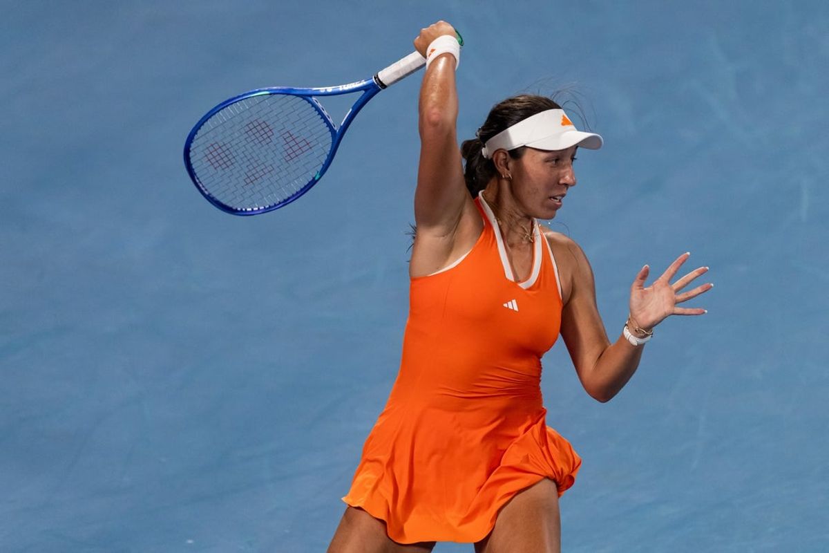 Jan 29, 2026; Melbourne, Victoria, Australia; Jessica Pegula of United States in action against Elena Rybakina of Kazakhstan in the semifinals of the womenís singles at the Australian Open at Rod Laver Arena in Melbourne Park. Mandatory Credit: Mike Frey-Imagn Images