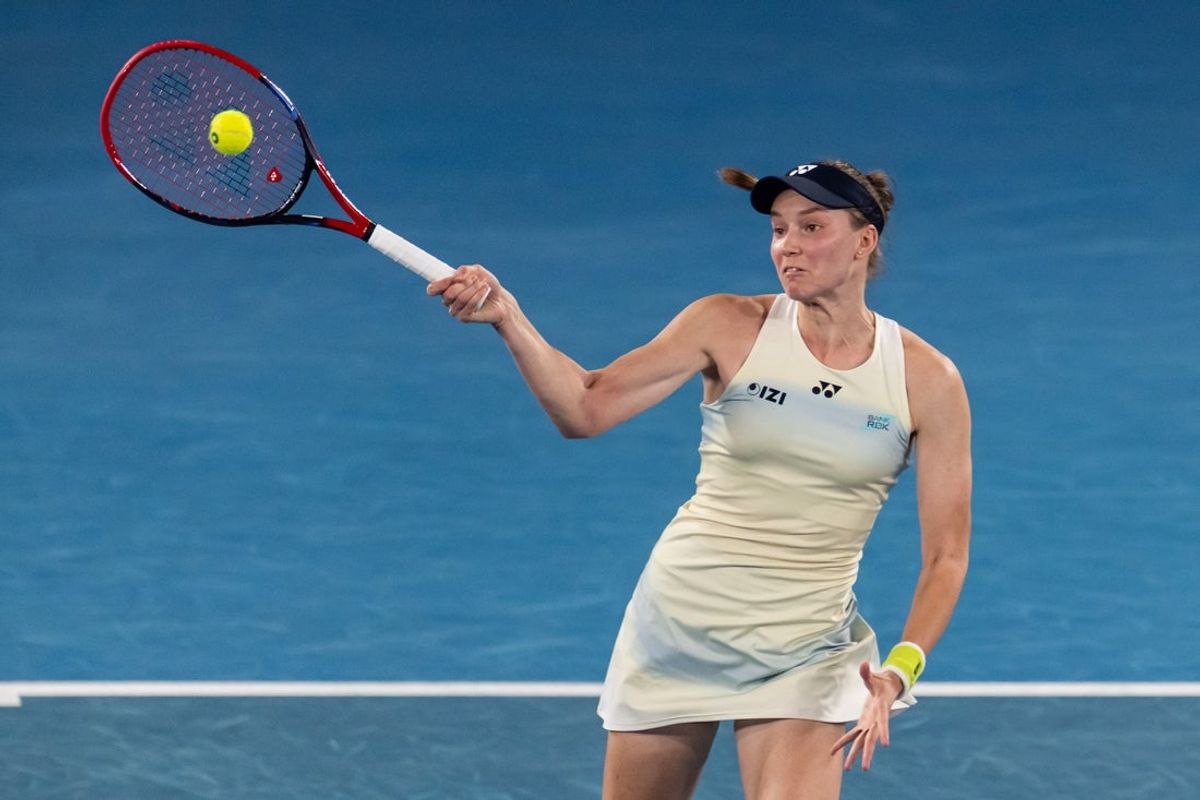 Jan 29, 2026; Melbourne, Victoria, Australia; Elena Rybakina of Kazakhstan in action against Jessica Pegula of United States in the semifinals of the womenís singles at the Australian Open at Rod Laver Arena in Melbourne Park. Mandatory Credit: Mike Frey-Imagn Images