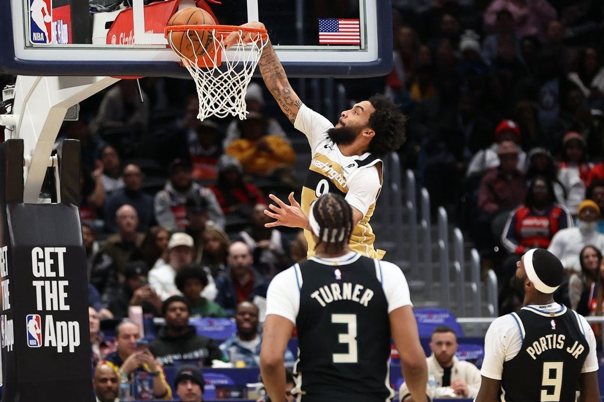 Jan 29, 2026; Washington, District of Columbia, USA; Washington Wizards forward Justin Champagnie (9) dunks during the first half against the Milwaukee Bucks at Capital One Arena. Mandatory Credit: Daniel Kucin Jr.-Imagn Images