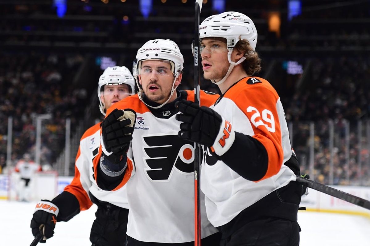 Jan 29, 2026; Boston, Massachusetts, USA; Philadelphia Flyers right wing Nikita Grebenkin (29) is congratulated by right wing Travis Konecny (11) after scoring a goal during the second period at TD Garden. Mandatory Credit: Bob DeChiara-Imagn Images