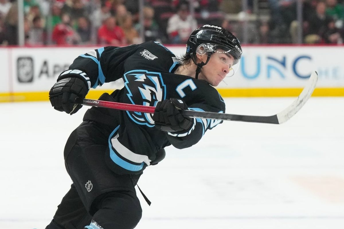 Jan 29, 2026; Raleigh, North Carolina, USA;  Utah Mammoth right wing Clayton Keller (9) takes s shot against the Carolina Hurricanes during the second period at Lenovo Center. Mandatory Credit: James Guillory-Imagn Images