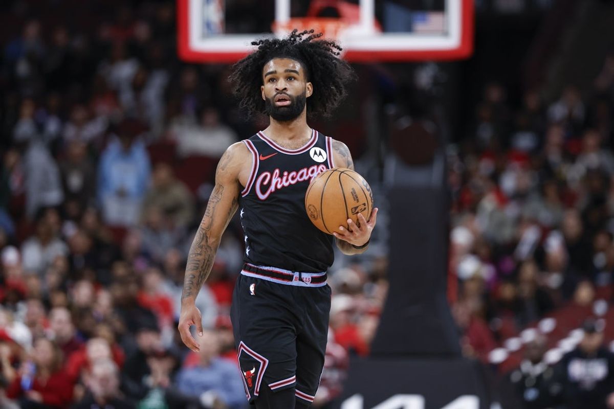Jan 29, 2026; Chicago, Illinois, USA; Chicago Bulls guard Coby White (0) brings the ball up court against the Miami Heat during the first half at United Center. Mandatory Credit: Kamil Krzaczynski-Imagn Images