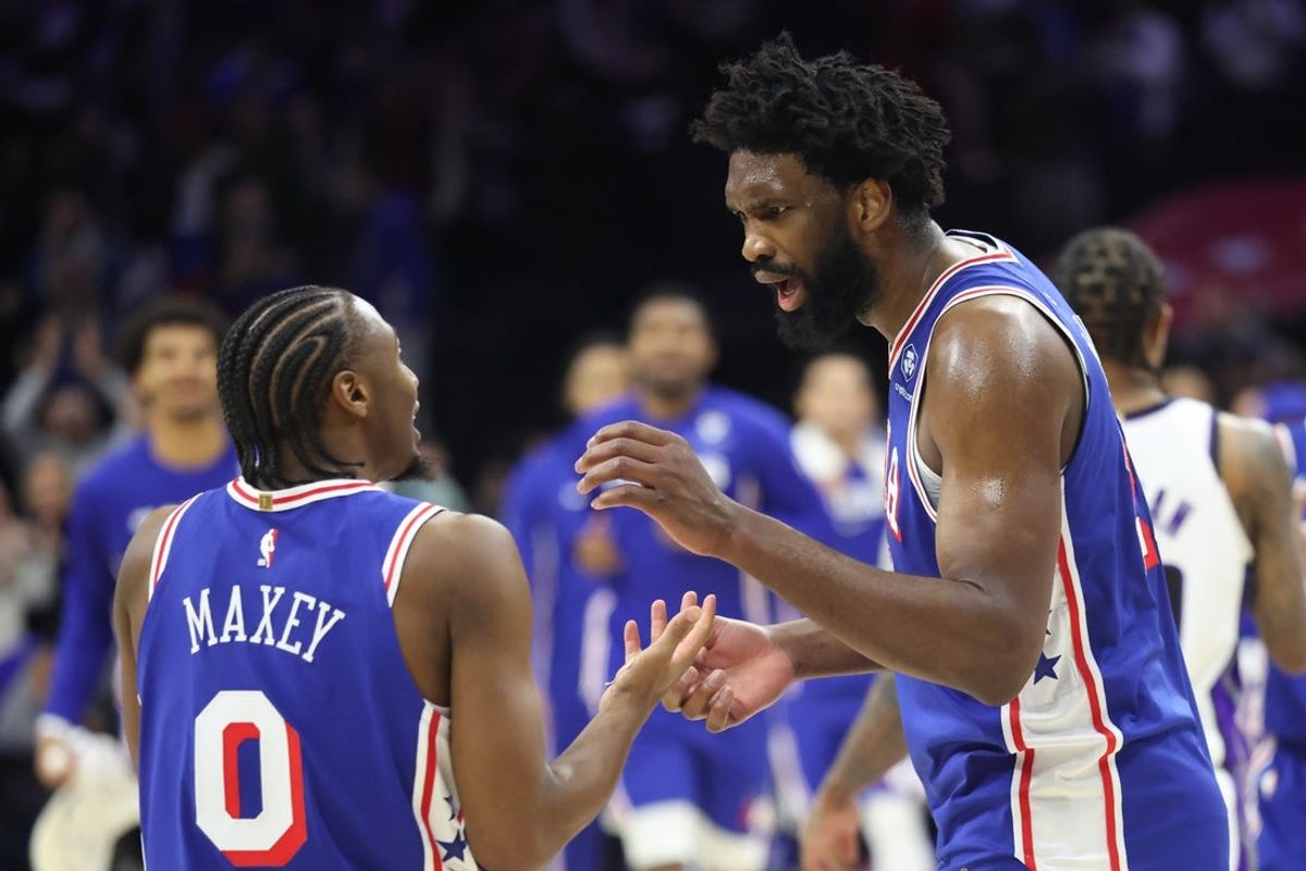 Jan 29, 2026; Philadelphia, Pennsylvania, USA; Philadelphia 76ers center Joel Embiid (21) reacts with Philadelphia 76ers guard Tyrese Maxey (L) after a victory against the Sacramento Kings at Xfinity Mobile Arena. Mandatory Credit: Bill Streicher-Imagn Images