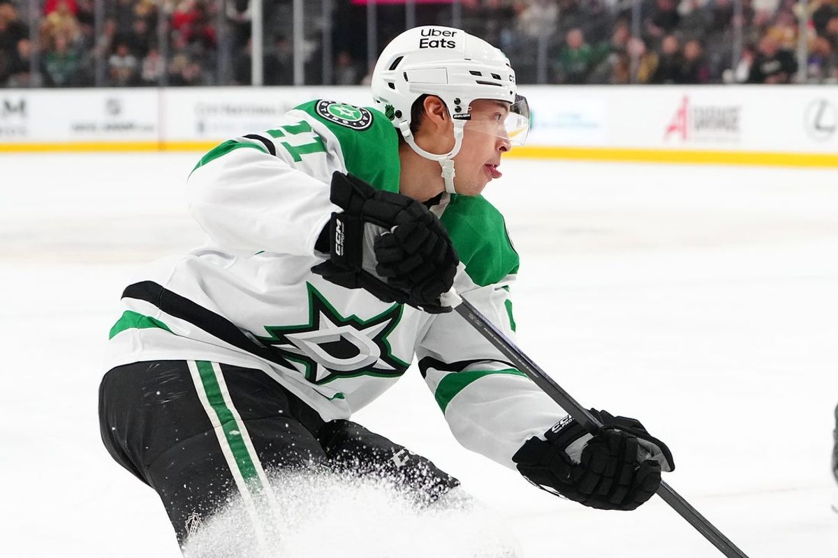 Jan 29, 2026; Las Vegas, Nevada, USA; Dallas Stars left wing Jason Robertson (21) skates against the Vegas Golden Knights during the first period at T-Mobile Arena. Mandatory Credit: Stephen R. Sylvanie-Imagn Images