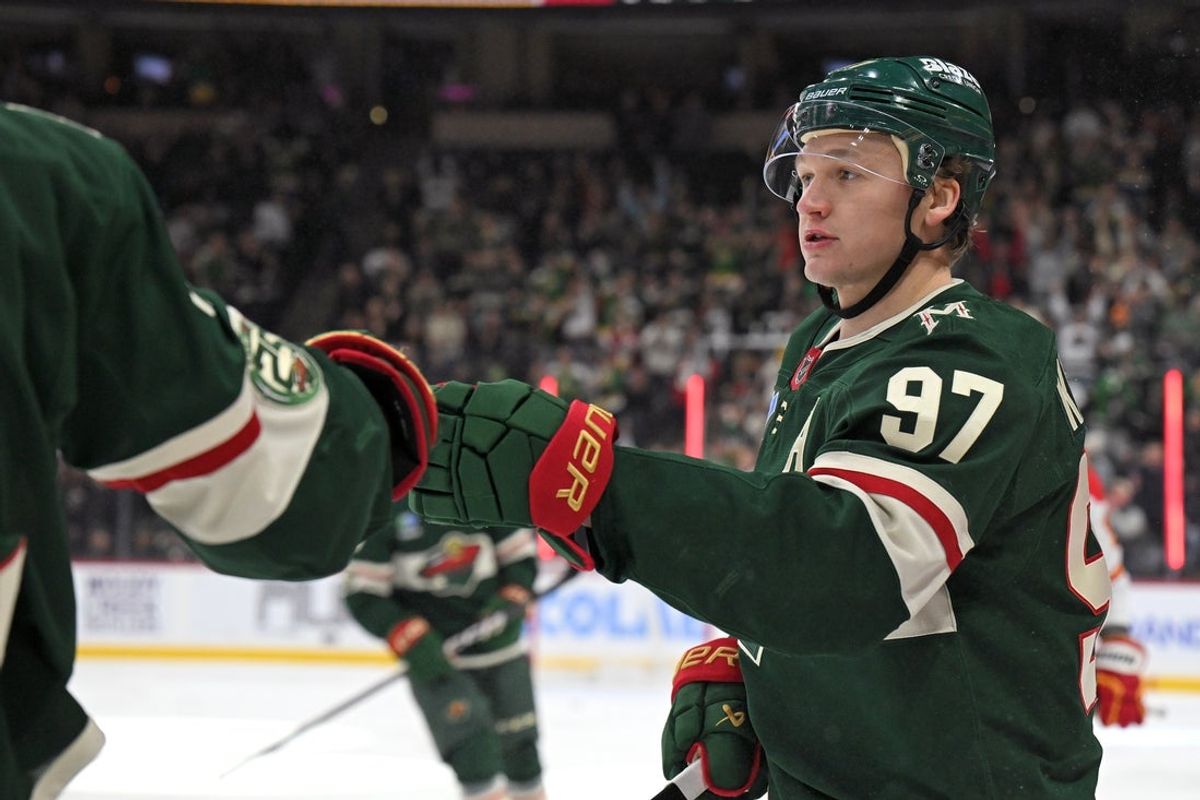 Jan 29, 2026; Saint Paul, Minnesota, USA;  Minnesota Wild forward Kirill Kaprizov (97) celebrates his empty net goal against the Calgary Flames during the third period at Grand Casino Arena. Mandatory Credit: Nick Wosika-Imagn Images