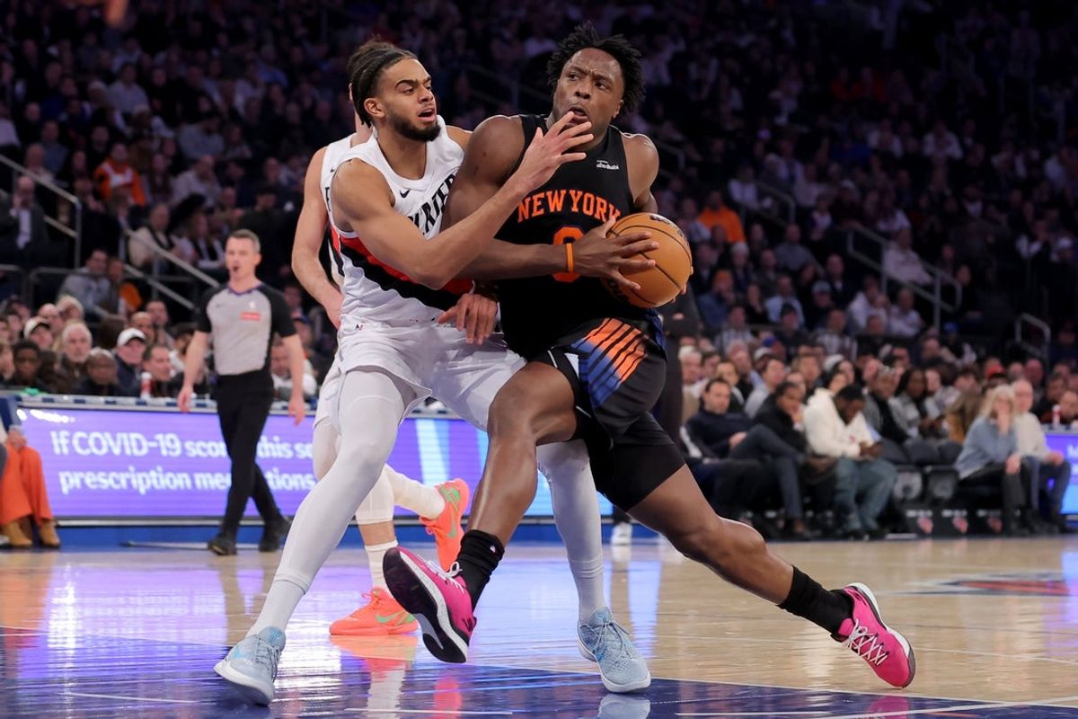 Jan 30, 2026; New York, New York, USA; New York Knicks forward Og Anunoby (8) drives to the basket against Portland Trail Blazers guard Rayan Rupert (21) during the first quarter at Madison Square Garden. Mandatory Credit: Brad Penner-Imagn Images