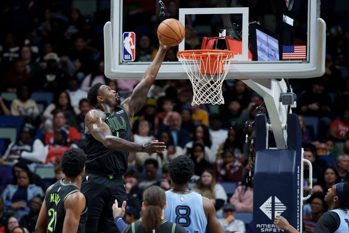 Jan 30, 2026; New Orleans, Louisiana, USA; New Orleans Pelicans forward Zion Williamson (1) shoots against Memphis Grizzlies forward Jaren Jackson Jr. (8) during the first half at Smoothie King Center. Mandatory Credit: Matthew Hinton-Imagn Images
