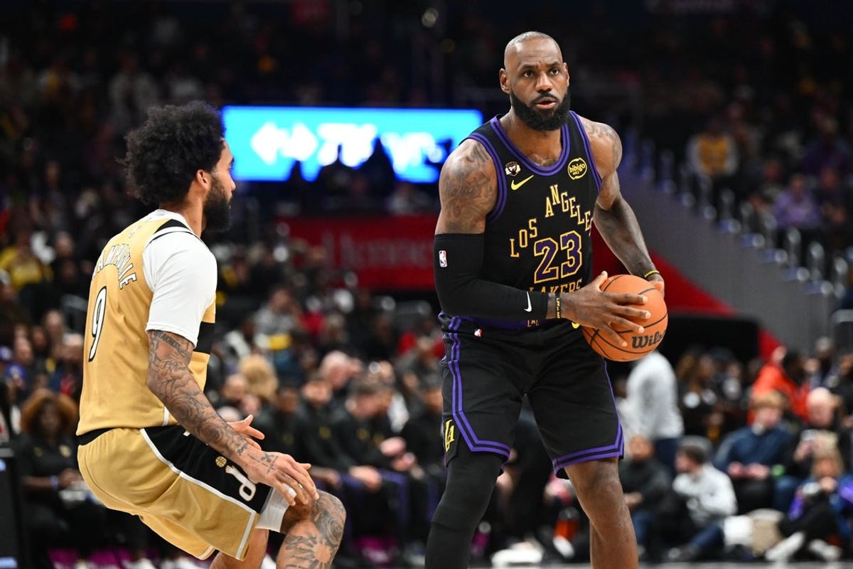 Jan 30, 2026; Washington, District of Columbia, USA; Los Angeles Lakers forward LeBron James (23) looks to pass against the Washington Wizards during the second half at Capital One Arena. Mandatory Credit: Brad Mills-Imagn Images