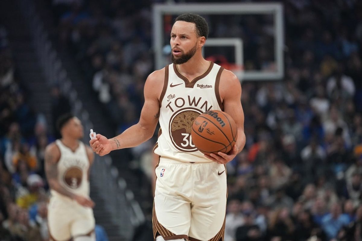 Jan 30, 2026; San Francisco, California, USA; Golden State Warriors guard Stephen Curry (30) reacts after committing a turnover against the Detroit Pistons in the first quarter at the Chase Center. Mandatory Credit: Cary Edmondson-Imagn Images