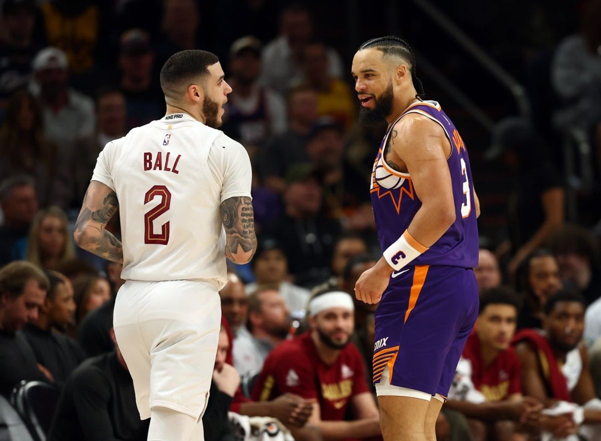 Jan 30, 2026; Phoenix, Arizona, USA; Phoenix Suns forward Dillon Brooks (3) talks to Cleveland Cavaliers guard Lonzo Ball (2) in the second half at Mortgage Matchup Center. Mandatory Credit: Mark J. Rebilas-Imagn Images