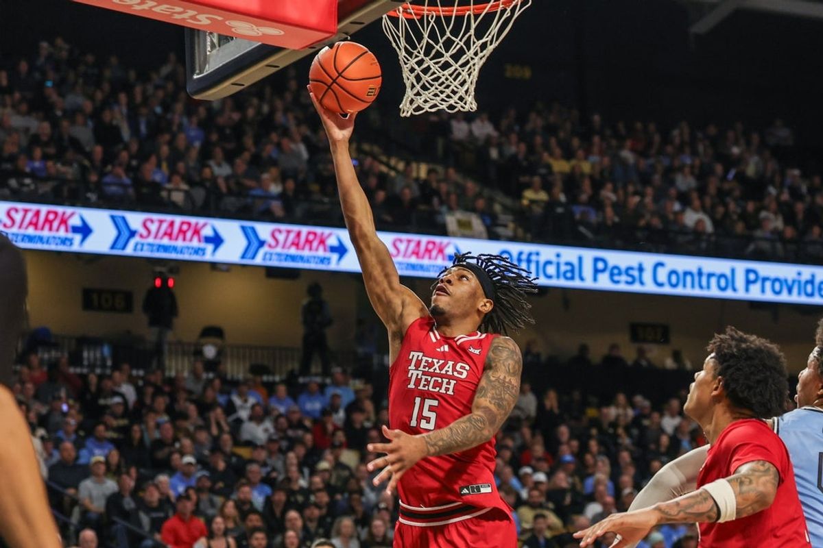 Jan 31, 2026; Orlando, Florida, USA; Texas Tech Red Raiders forward JT Toppin (15) shoots against against the UCF Knights during the first half at Addition Financial Arena. Mandatory Credit: Mike Watters-Imagn Images
