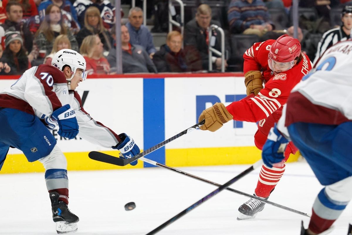 Jan 31, 2026; Detroit, Michigan, USA;  Detroit Red Wings defenseman Ben Chiarot (8) shoots in the second period against the Colorado Avalanche at Little Caesars Arena. Mandatory Credit: Rick Osentoski-Imagn Images