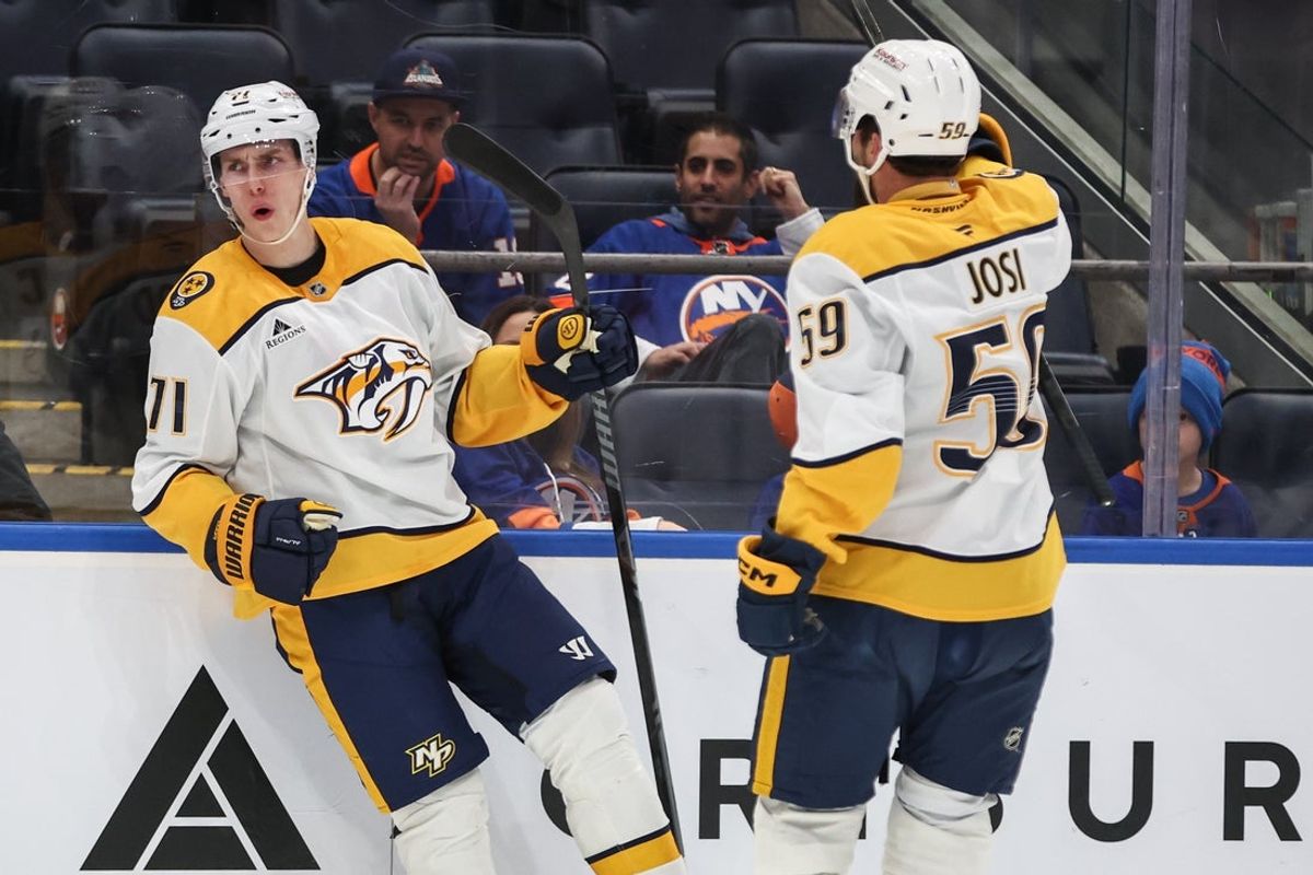 Jan 31, 2026; Elmont, New York, USA;  Nashville Predators right wing Matthew Wood (71) celebrates with defenseman Roman Josi (59) after scoring a goal in the first period against the New York Islanders at UBS Arena. Mandatory Credit: Wendell Cruz-Imagn Images