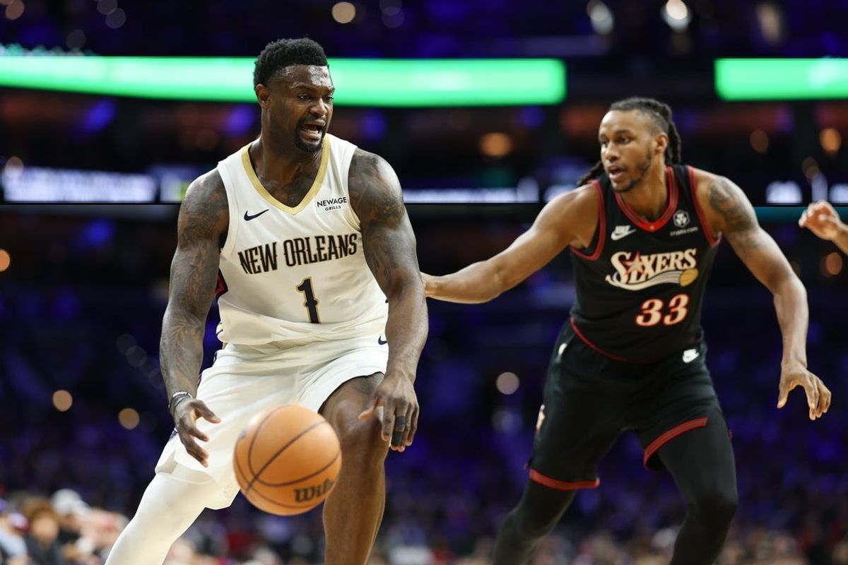 Jan 31, 2026; Philadelphia, Pennsylvania, USA; New Orleans Pelicans forward Zion Williamson (1) controls the ball against Philadelphia 76ers forward Jabari Walker (33) during the first quarter at Xfinity Mobile Arena. Mandatory Credit: Bill Streicher-Imagn Images