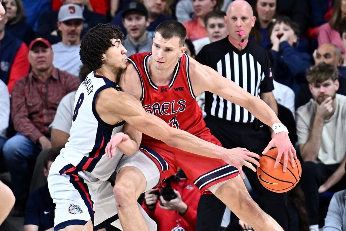 Jan 31, 2026; Spokane, Washington, USA; Gonzaga Bulldogs guard Jalen Warley (8) knocks the ball away from Saint Mary's Gaels forward Paulius Murauskas (23) in the first half at McCarthey Athletic Center. Mandatory Credit: James Snook-Imagn Images