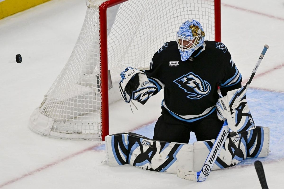 Jan 31, 2026; Salt Lake City, Utah, USA; Utah Mammoth goalie Karel Vejmelka (70) watches his a shot he deflected during third period against the Dallas Stars at Delta Center. Mandatory Credit: Peter Creveling-Imagn Images