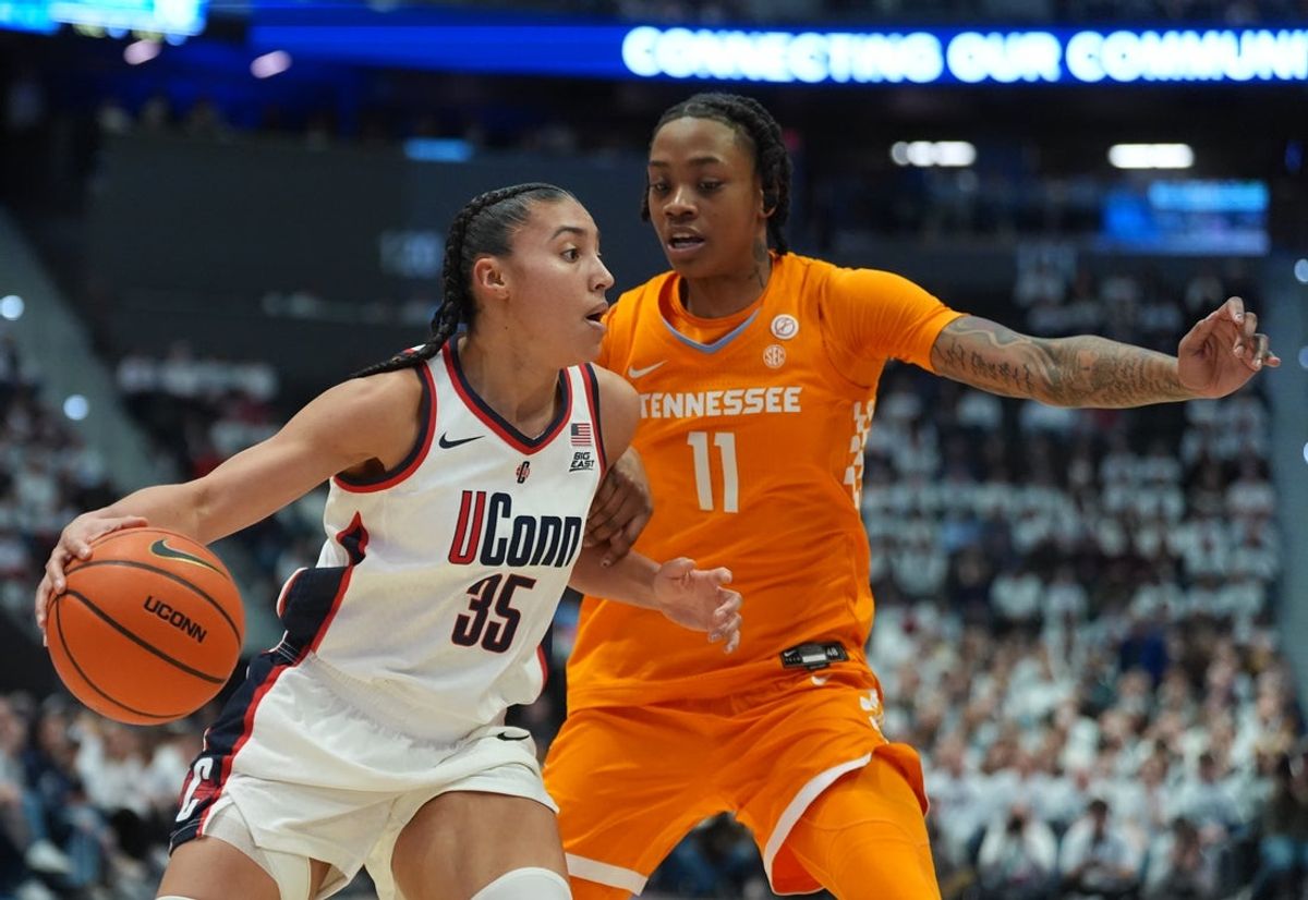 Feb 1, 2026; Hartford, Connecticut, USA; UConn Huskies guard Azzi Fudd (35) drives the ball against Tennessee Volunteers forward Zee Spearman (11) in the first half at PeoplesBank Arena. Mandatory Credit: David Butler II-Imagn Images