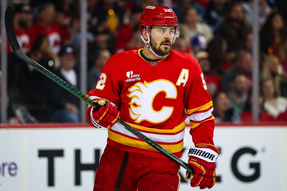 Jan 31, 2026; Calgary, Alberta, CAN; Calgary Flames defenseman MacKenzie Weegar (52) against the San Jose Sharks during the first period at Scotiabank Saddledome. Mandatory Credit: Sergei Belski-Imagn Images