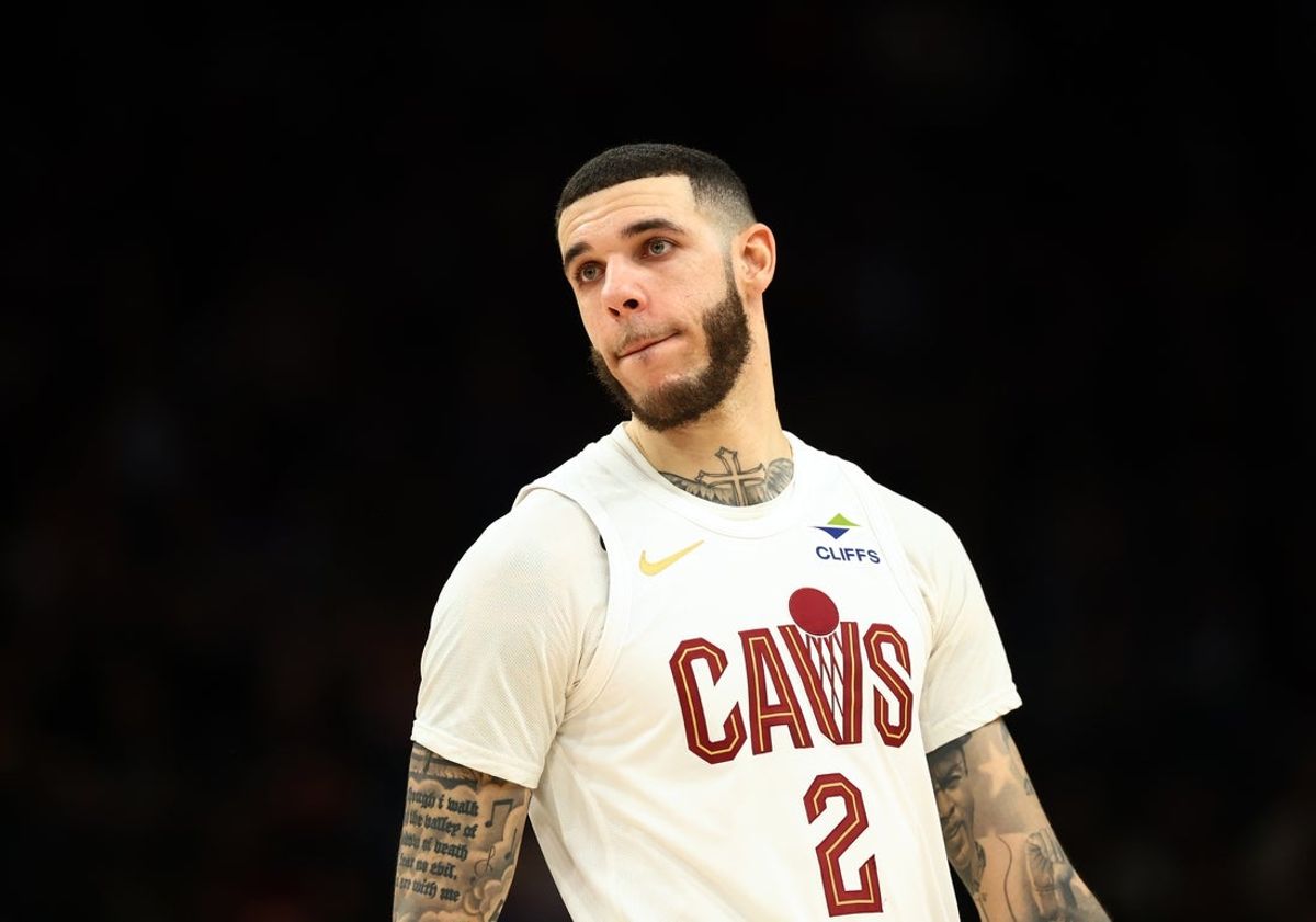Jan 30, 2026; Phoenix, Arizona, USA; Cleveland Cavaliers guard Lonzo Ball (2) against the Phoenix Suns at Mortgage Matchup Center. Mandatory Credit: Mark J. Rebilas-Imagn Images