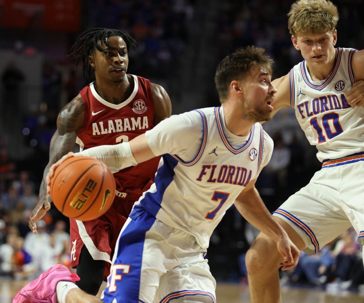 Florida guard Urban Klavzar (7) drives for the basket during the second half of an NCAA Mens basketball game at Steven C. O'Connell Center Exactek arena in Gainesville, FL on Sunday, February 1, 2026. Florida beat Alabama 100-77. [Alan Youngblood/Gainesville Sun]