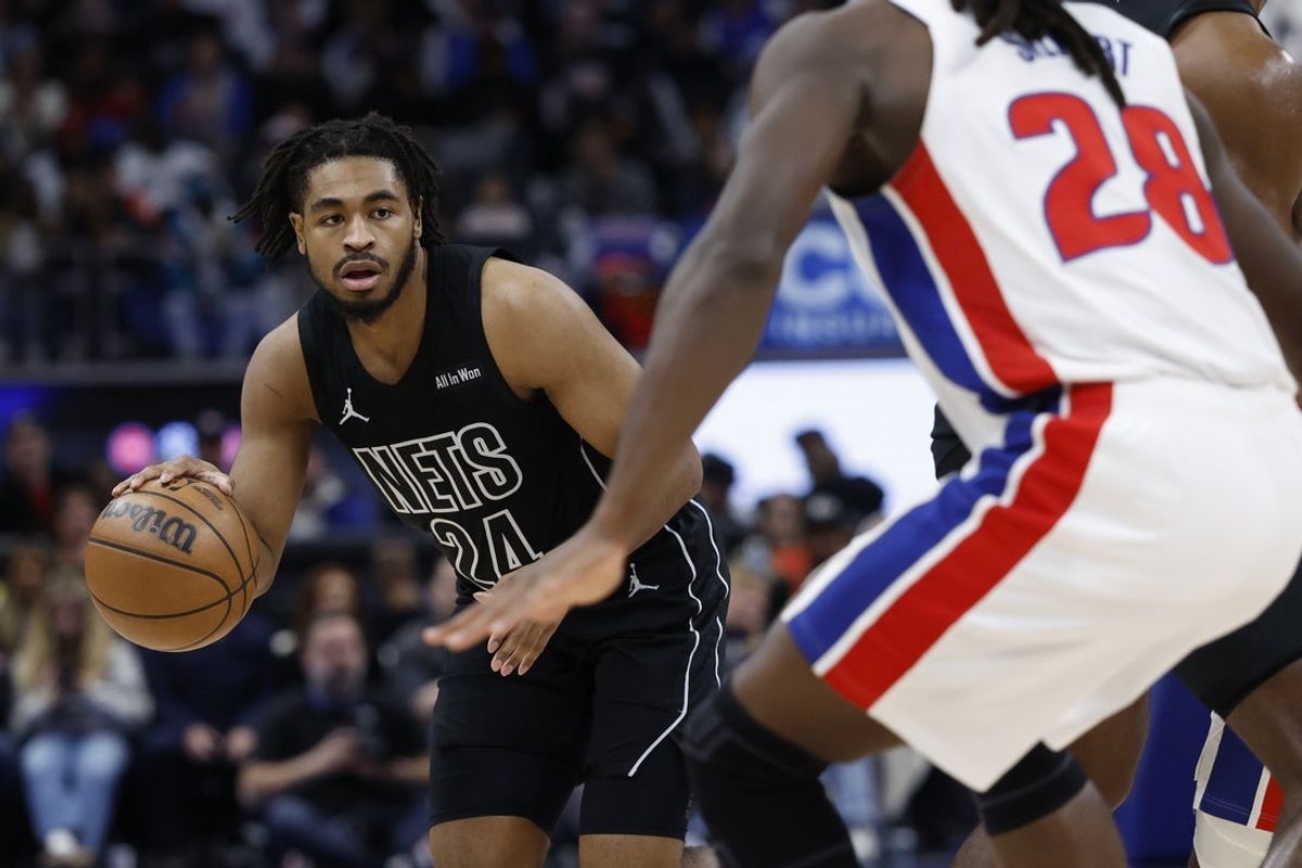 Feb 1, 2026; Detroit, Michigan, USA;  Brooklyn Nets guard Cam Thomas (24) dribbles defended by Detroit Pistons forward Isaiah Stewart (28) in the first half at Little Caesars Arena. Mandatory Credit: Rick Osentoski-Imagn Images