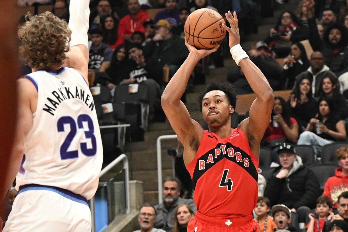 Feb 1, 2026; Toronto, Ontario, CAN;  Toronto Raptors forward Scottie Barnes (4) shoots the ball against Utah Jazz forward Lauri Markkanen (23) in the first half at Scotiabank Arena. Mandatory Credit: Dan Hamilton-Imagn Images