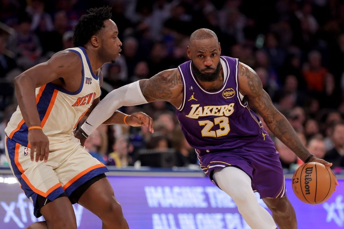 Feb 1, 2026; New York, New York, USA; Los Angeles Lakers forward LeBron James (23) drives to the basket against New York Knicks forward OG Anunoby (8) during the third quarter at Madison Square Garden. Mandatory Credit: Brad Penner-Imagn Images