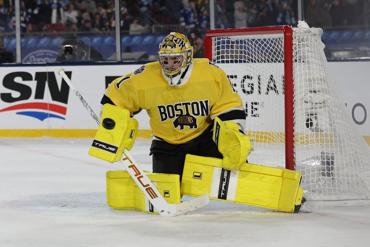 Feb 1, 2026; Tampa Bay, Florida, USA; Boston Bruins goaltender Jeremy Swayman (1) prepares to make the save against the Tampa Bay Lightning during overtime in the 2026 Stadium Series ice hockey game at Raymond James Stadium. Mandatory Credit: Kim Klement Neitzel-Imagn Images