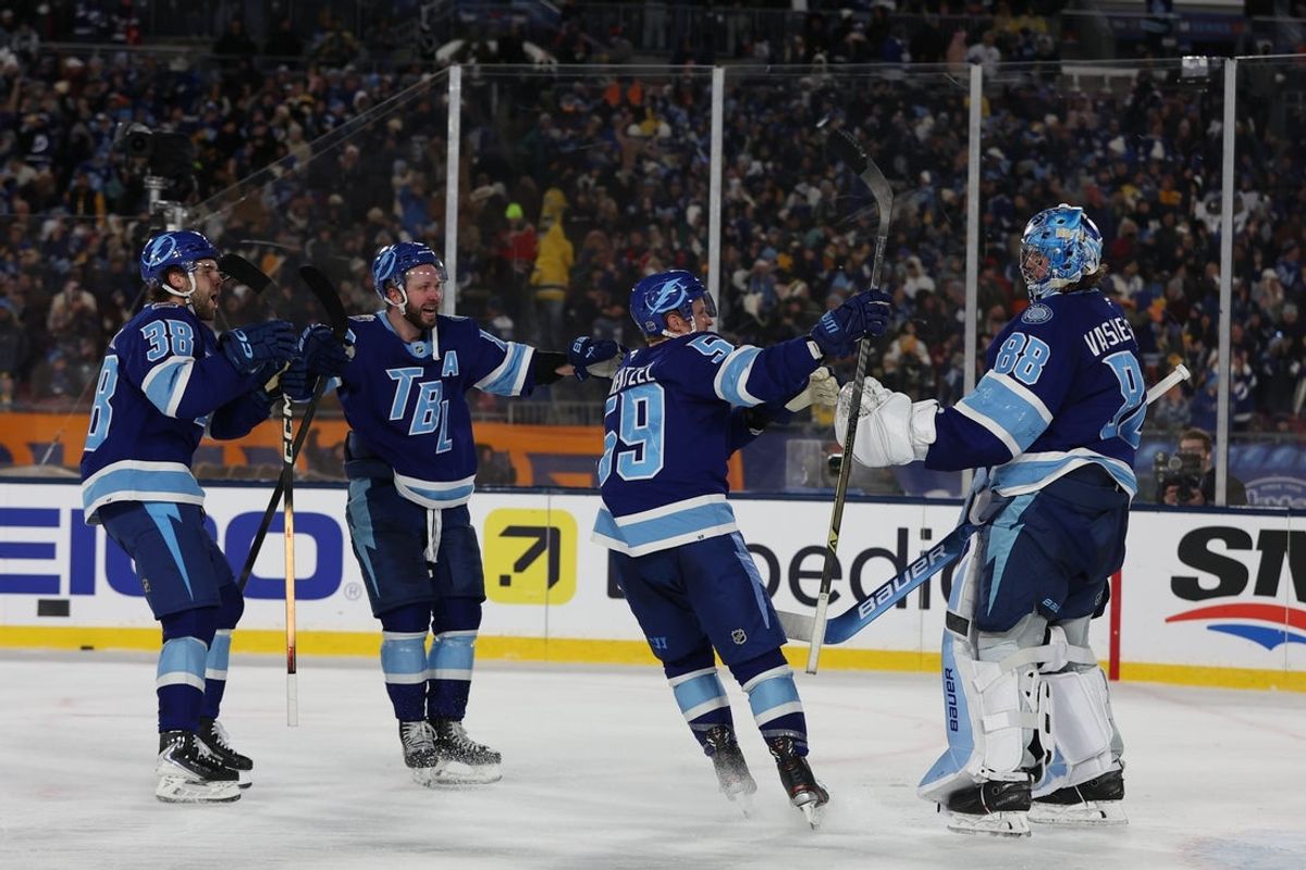 Feb 1, 2026; Tampa Bay, Florida, USA; Tampa Bay Lightning center Jake Guentzel (59) and goaltender Andrei Vasilevskiy (88) reacts follow a shootout victory against the Boston Bruins in the 2026 Stadium Series ice hockey game at Raymond James Stadium. Mandatory Credit: Kim Klement Neitzel-Imagn Images
