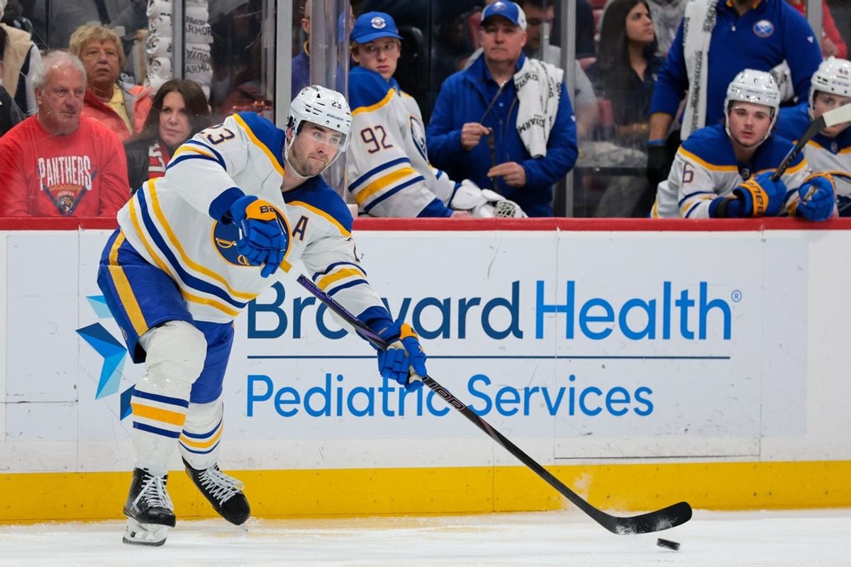Feb 2, 2026; Sunrise, Florida, USA; Buffalo Sabres defenseman Mattias Samuelsson (23) moves the puck against the Florida Panthers during the second period at Amerant Bank Arena. Mandatory Credit: Sam Navarro-Imagn Images