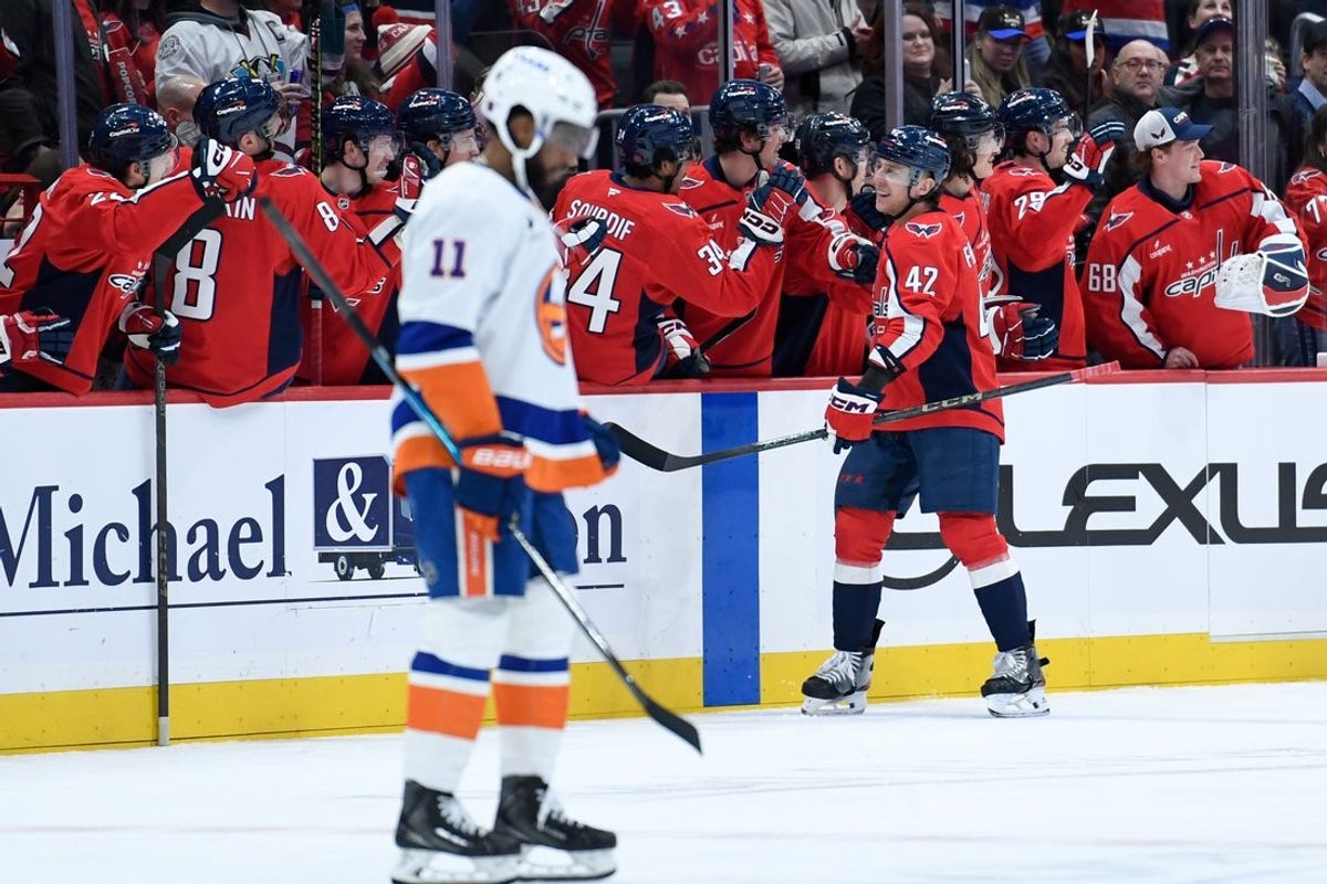Feb 2, 2026; Washington, District of Columbia, USA; Washington Capitals defenseman Martin Fehervary (42) celebrates with teammates after scoring a goal against the New York Islanders during the second period at Capital One Arena. Mandatory Credit: Hannah Foslien-Imagn Images