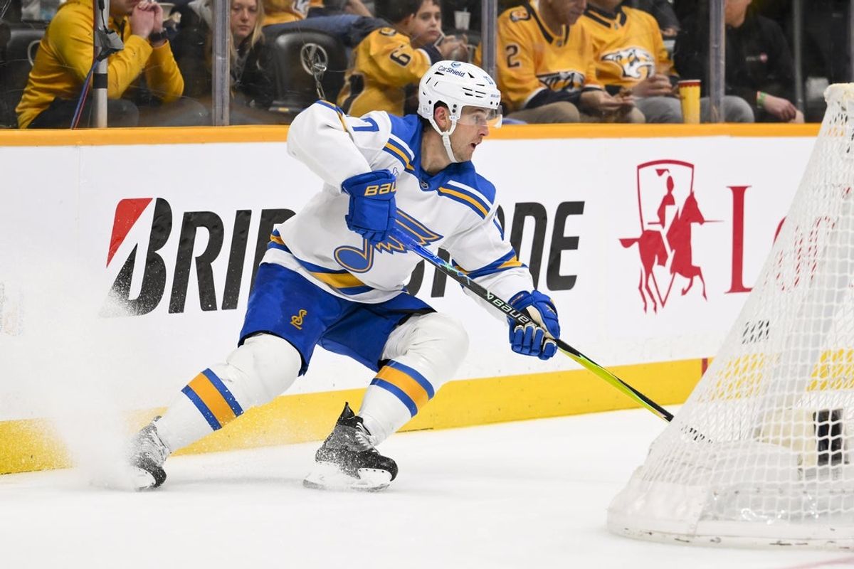 Feb 2, 2026; Nashville, Tennessee, USA;  St. Louis Blues center Nick Bjugstad (77) skates behind the net against the Nashville Predators during the second period at Bridgestone Arena. Mandatory Credit: Steve Roberts-Imagn Images