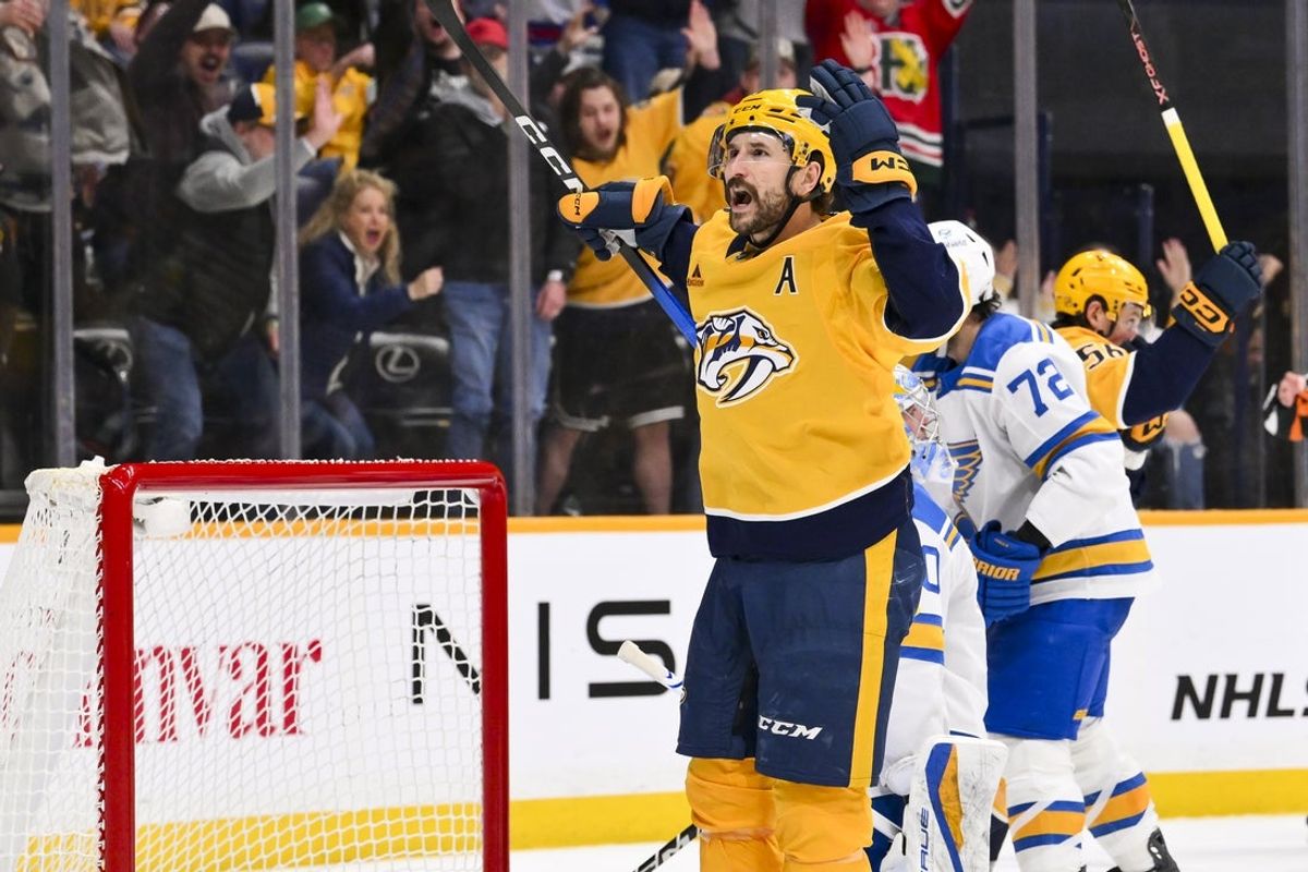 Feb 2, 2026; Nashville, Tennessee, USA;  Nashville Predators left wing Filip Forsberg (9) celebrates his goal against the St. Louis Blues during the second period at Bridgestone Arena. Mandatory Credit: Steve Roberts-Imagn Images