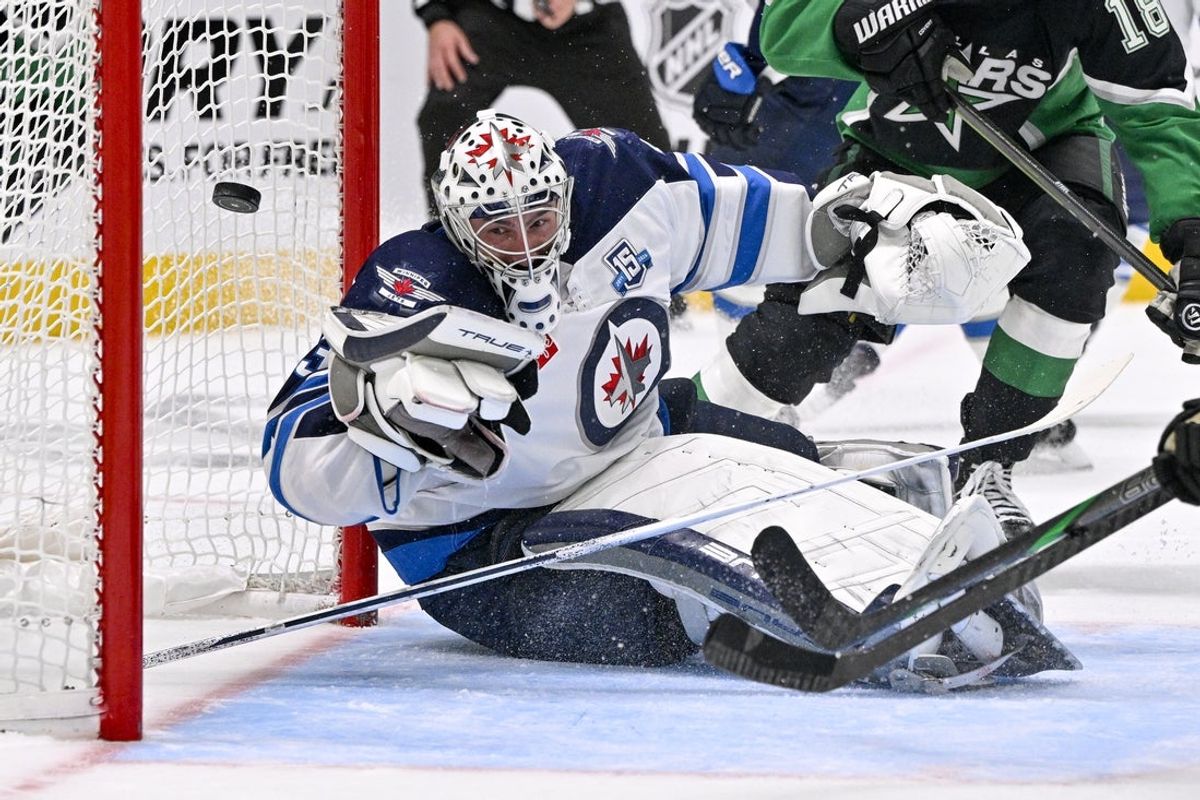 Feb 2, 2026; Dallas, Texas, USA; Winnipeg Jets goaltender Connor Hellebuyck (37) allows a goal to Dallas Stars defenseman Nils Lundkvist (not pictured) during the second period at the American Airlines Center. Mandatory Credit: Jerome Miron-Imagn Images