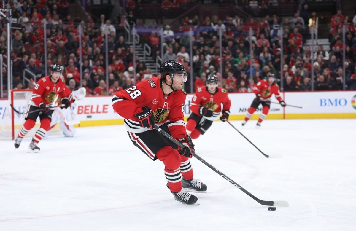 Feb 2, 2026; Chicago, Illinois, USA; Chicago Blackhawks left wing Andre Burakovsky (28) skates with the puck during the second period against the San Jose Sharks at United Center. Mandatory Credit: Talia Sprague-Imagn Images
