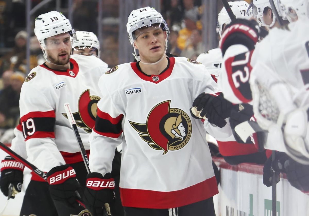 Feb 2, 2026; Pittsburgh, Pennsylvania, USA;  Ottawa Senators center Tim Stutzle (18) celebrates with the bench after scoring a goal against the Pittsburgh Penguins during the third period at PPG Paints Arena. Mandatory Credit: Charles LeClaire-Imagn Images