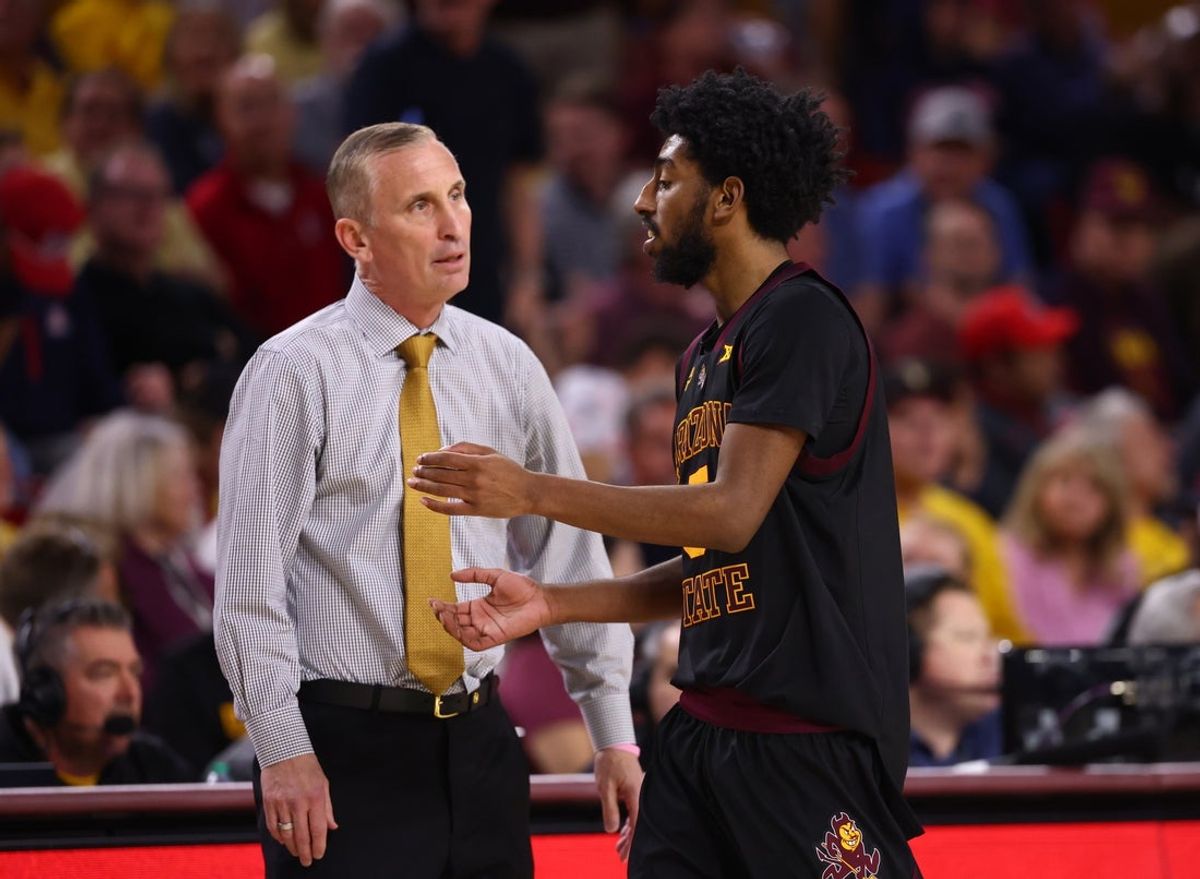 Jan 31, 2026; Tempe, Arizona, USA; Arizona State Sun Devils head coach Bobby Hurley with guard Maurice Odum (5) against the Arizona Wildcats at Desert Financial Arena. Mandatory Credit: Mark J. Rebilas-Imagn Images