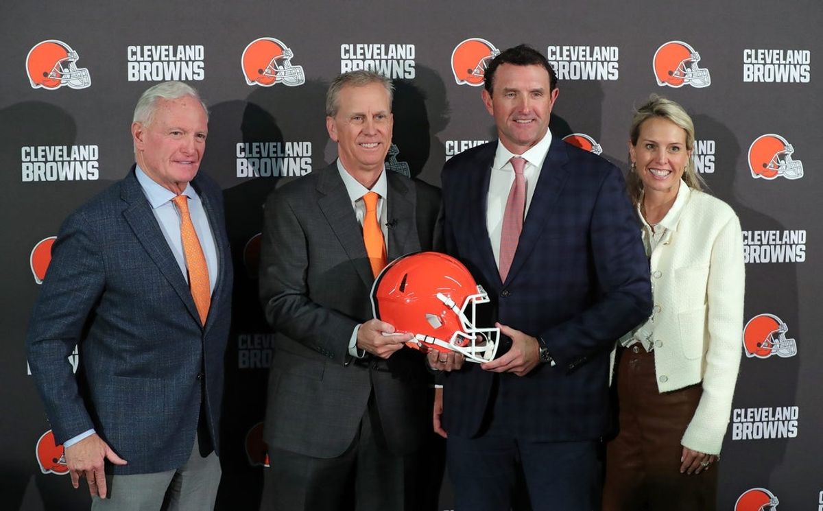 New Cleveland Browns head coach Todd Monken, center, poses with members of the ownership group, from left, Jimmy Haslam, JW Johnson and Whitney Haslam-Johnson during Monken’s introductory press conference at the team's training facility, Feb. 3, 2026.