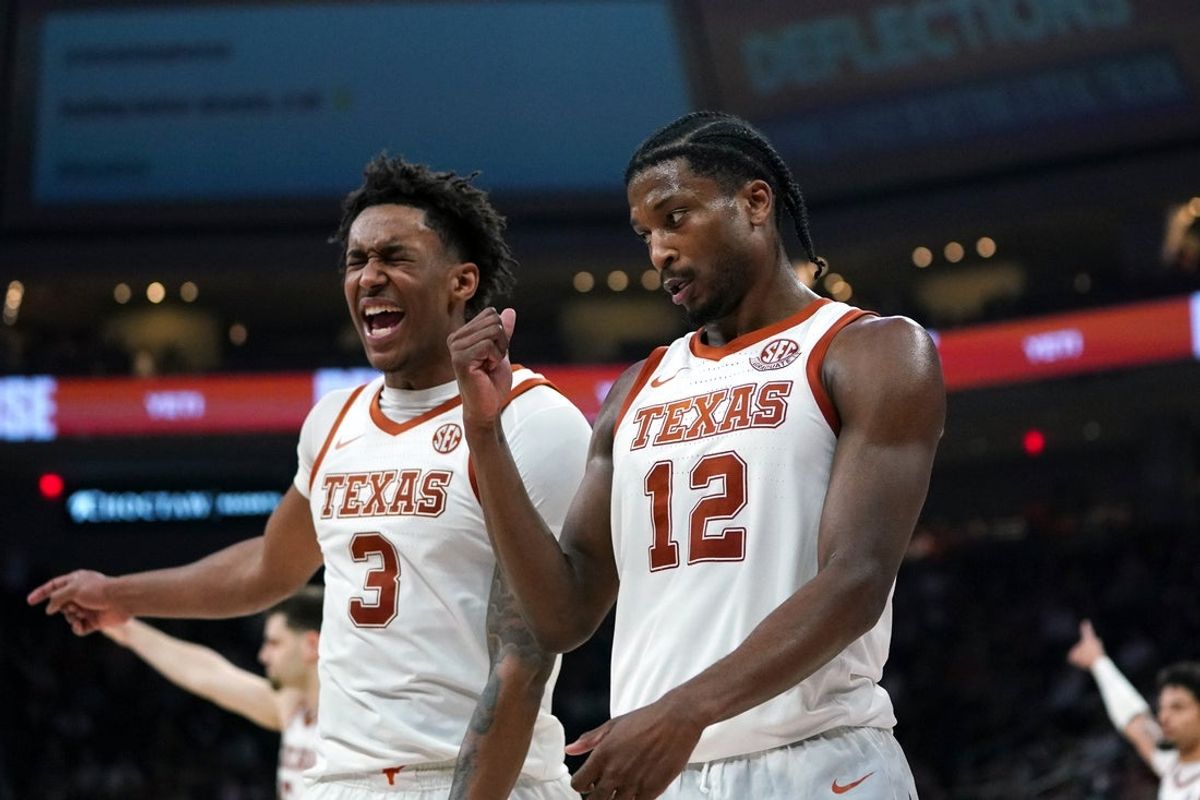 Feb 3, 2026; Austin, Texas, USA; Texas Longhorns guard Tramon Mark (12) and Texas Longhorns guard Dailyn Swain (3) react to a basket during the last few seconds of the game against the South Carolina Gamecocks at Moody Center. Mandatory Credit: Dustin Safranek-Imagn Images