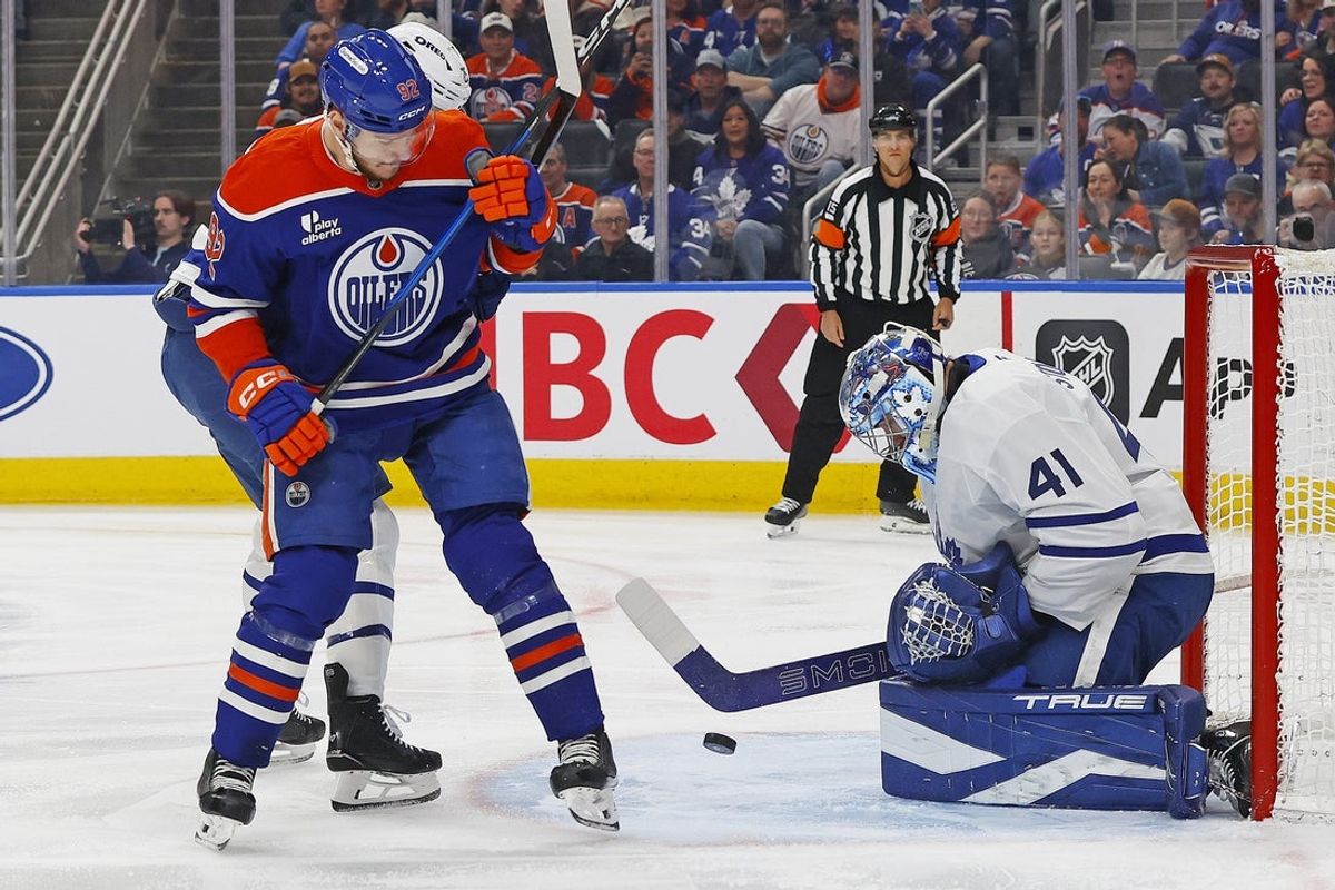 Feb 3, 2026; Edmonton, Alberta, CAN;  Edmonton Oilers forward Vasily Podkolzin (92) looks for a loose puck in front of Toronto Maple Leafs goaltender Anthony Stolarz (41) during the first periodat Rogers Place. Mandatory Credit: Perry Nelson-Imagn Images