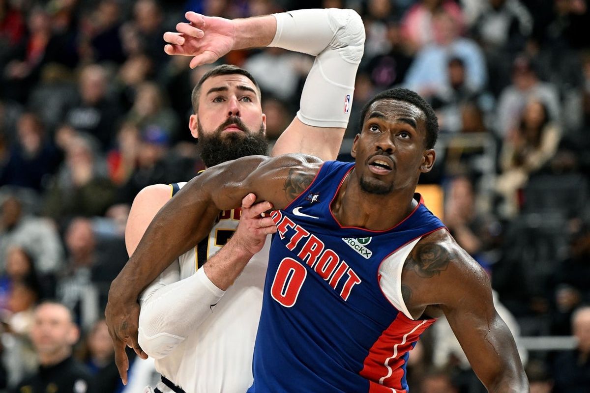 Feb 3, 2026; Detroit, Michigan, USA;  Detroit Pistons center Jalen Duren (0) battles for position on a foul shot with Denver Nuggets center Jonas Valanciunas (17) in the third quarter at Little Caesars Arena. Mandatory Credit: Lon Horwedel-Imagn Images