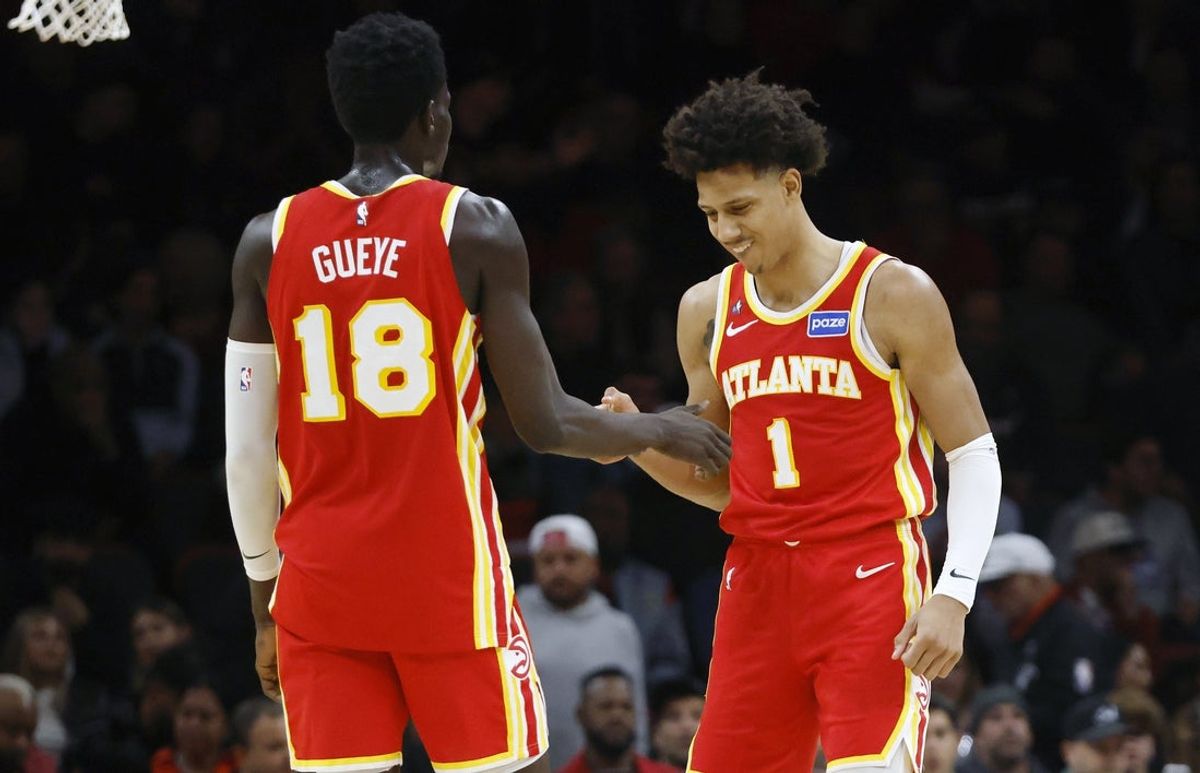 Feb 3, 2026; Miami, Florida, USA;  Atlanta Hawks forward Mouhamed Gueye (18) and forward Jalen Johnson (1) react against the Miami Heat during the second half at Kaseya Center. Mandatory Credit: Rhona Wise-Imagn Images