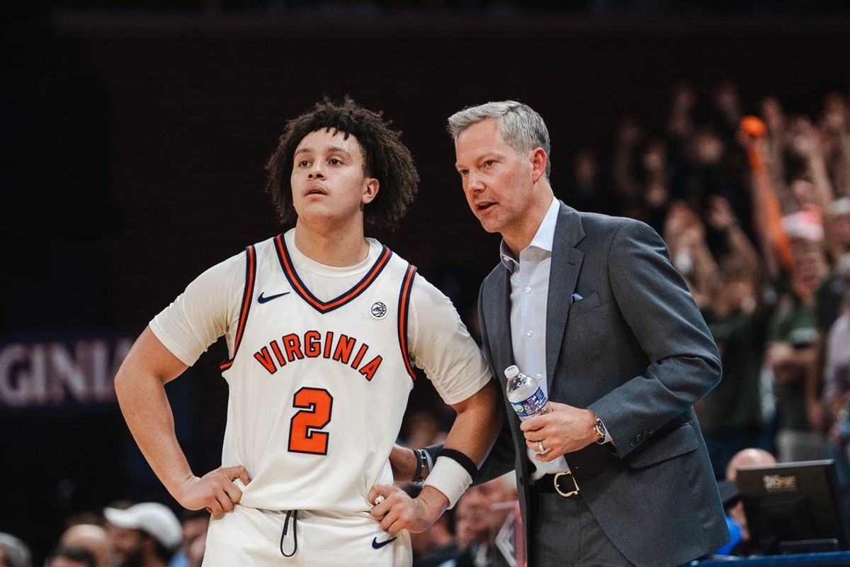 Feb 3, 2026; Charlottesville, Virginia, USA; Virginia Cavaliers guard Chance Mallory (2) talks with head coach Ryan Odom in the second half against the Pittsburgh Panthers at John Paul Jones Arena. Mandatory Credit: Emily Faith Morgan-Imagn Images