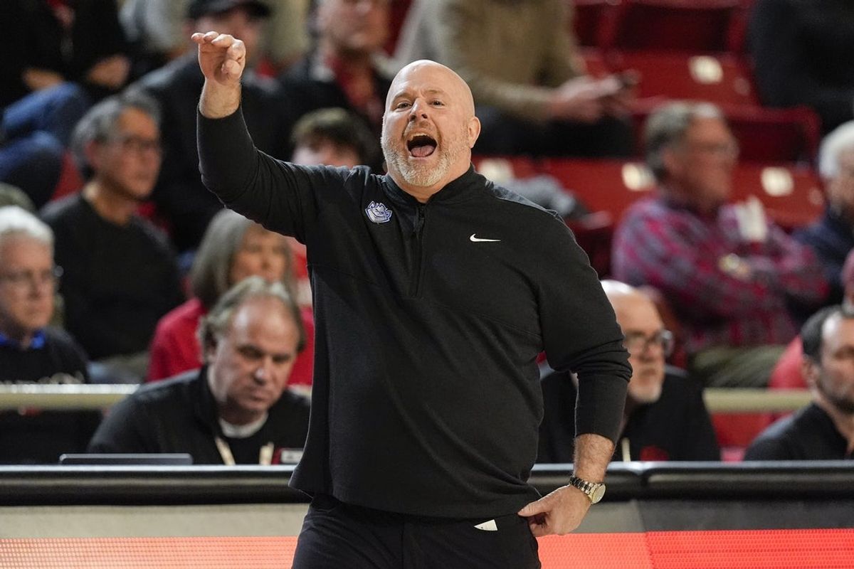 Feb 3, 2026; Davidson, North Carolina, USA; Saint Louis Billikens head coach Josh Schertz yells to his team during the second half against the Davidson Wildcats at McKillop Court at John M. Belk Arena. Mandatory Credit: Jim Dedmon-Imagn Images