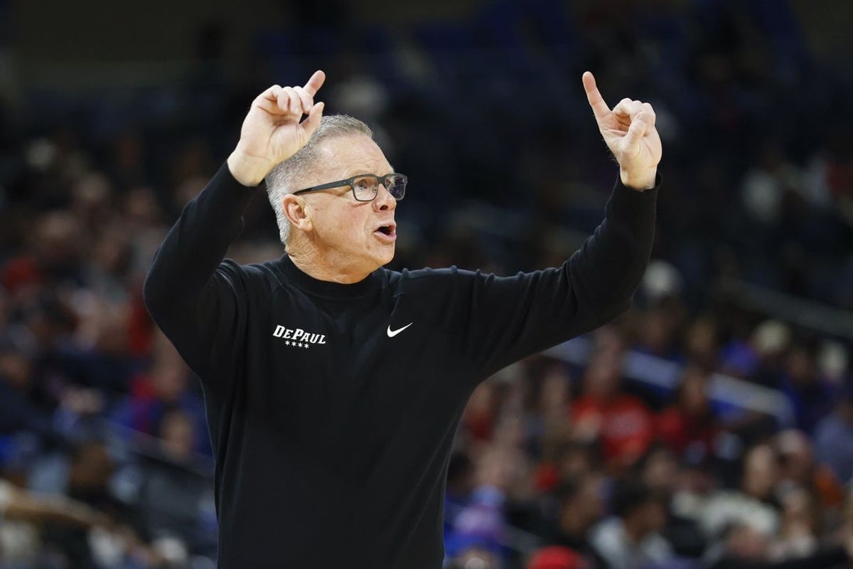 Feb 3, 2026; Chicago, Illinois, USA; DePaul Blue Demons head coach Chris Holtmann directs his team against the St. John's Red Storm during the first half at Wintrust Arena. Mandatory Credit: Kamil Krzaczynski-Imagn Images