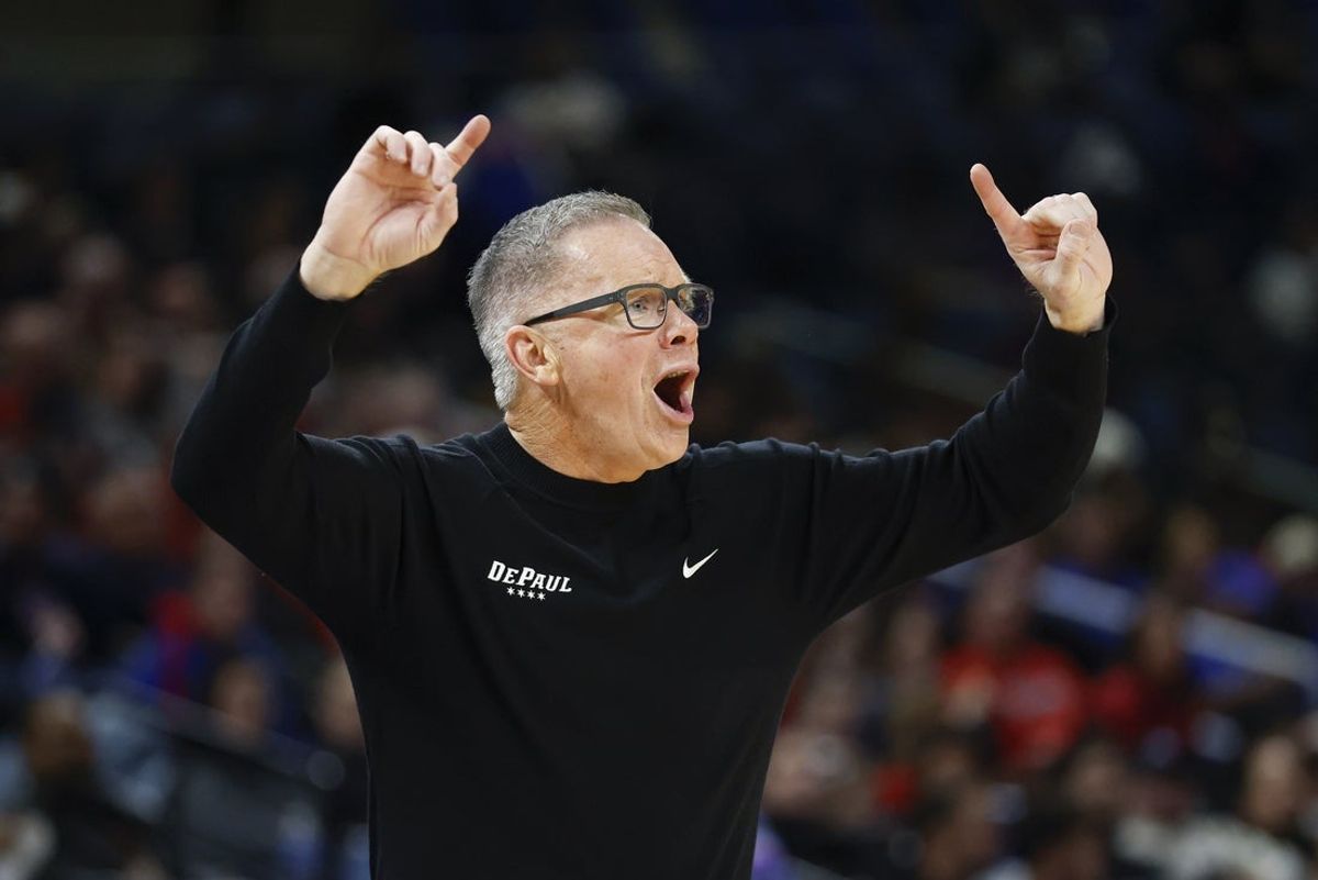 Feb 3, 2026; Chicago, Illinois, USA; DePaul Blue Demons head coach Chris Holtmann directs his team against the St. John's Red Storm during the first half at Wintrust Arena. Mandatory Credit: Kamil Krzaczynski-Imagn Images