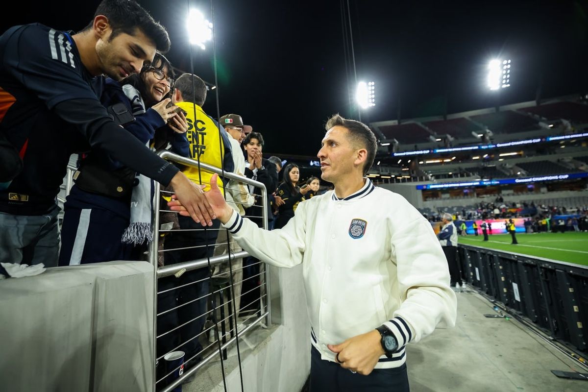 Feb 3, 2026; San Diego, California, USA; San Diego FC manager Mikey Varas interacts with fans after the team’s win over Pumas UNAM at Snapdragon Stadium. Mandatory Credit: Chadd Cady-Imagn Images